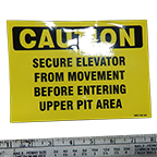 Sign "CAUTION Secure Elevator From Movement