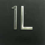 BRAILLE #1L, 4"X4",BLK W/ SS